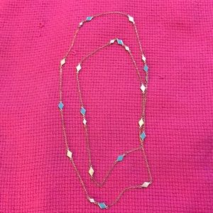 Long gold necklace with turquoise/diamonds